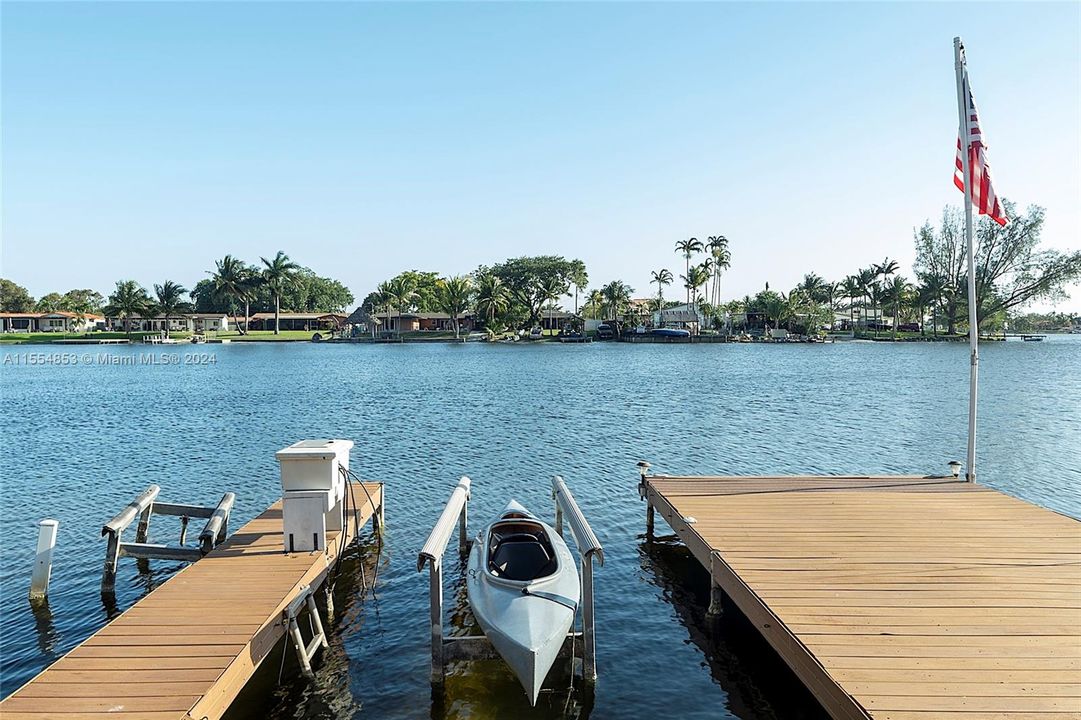 Backyard with Pool, Pavers, Gazebo with Grill, Trees, Dock, Ramp and Sun Deck