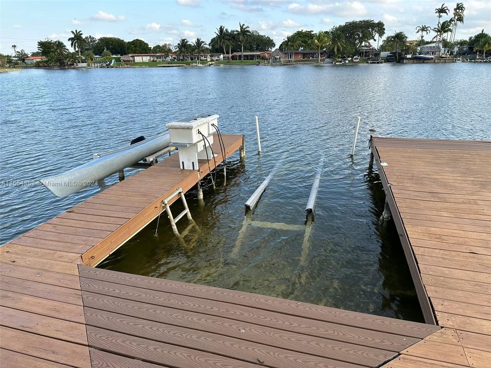 Backyard with Pool, Pavers, Gazebo with Grill, Trees, Dock, Ramp and Sun Deck