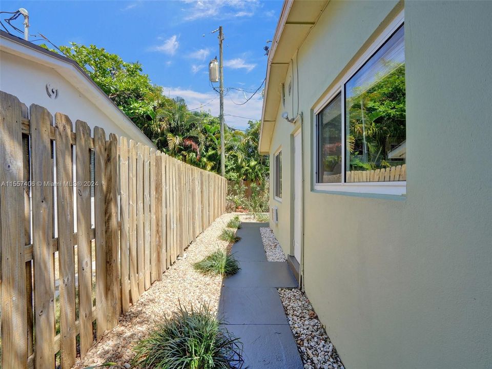 Walkway to back space and laundry
