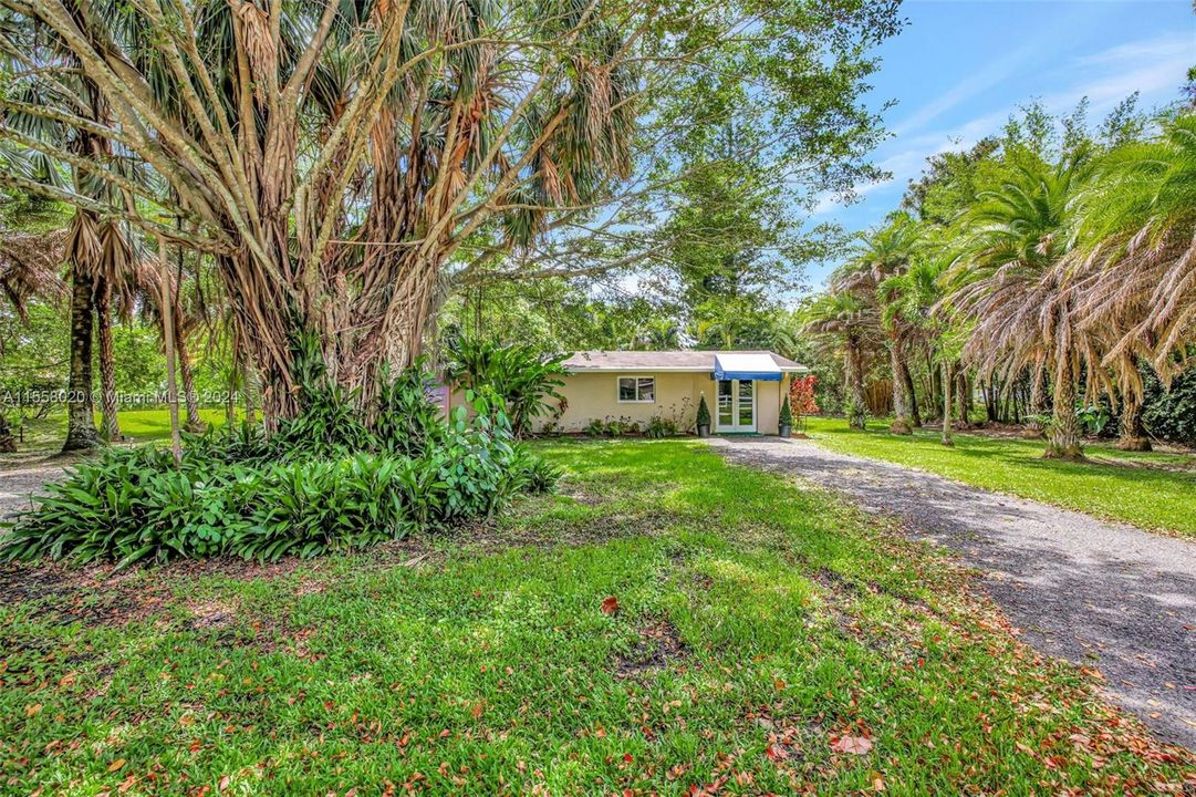 Separate entrance off north street w/ mature trees