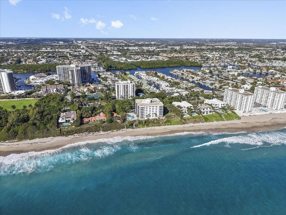Aerial view of coastline & neighborhood