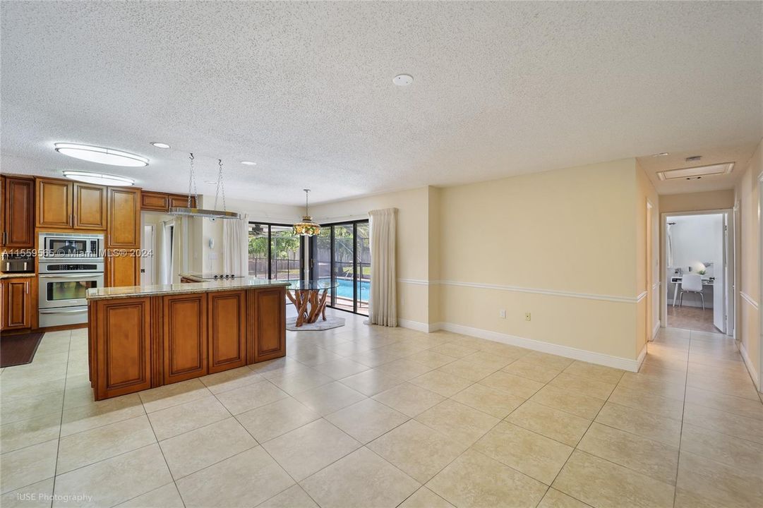 Kitchen opens to Family Room