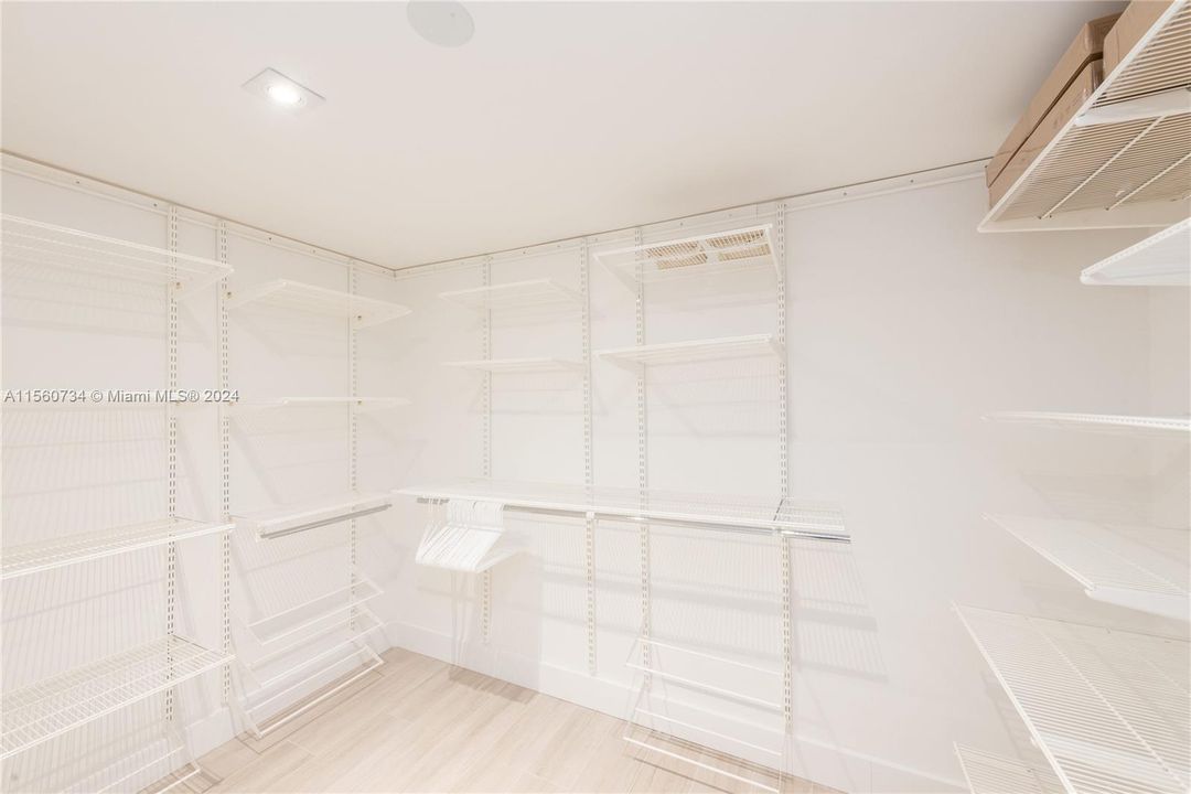 Huge master bedroom walk in closet