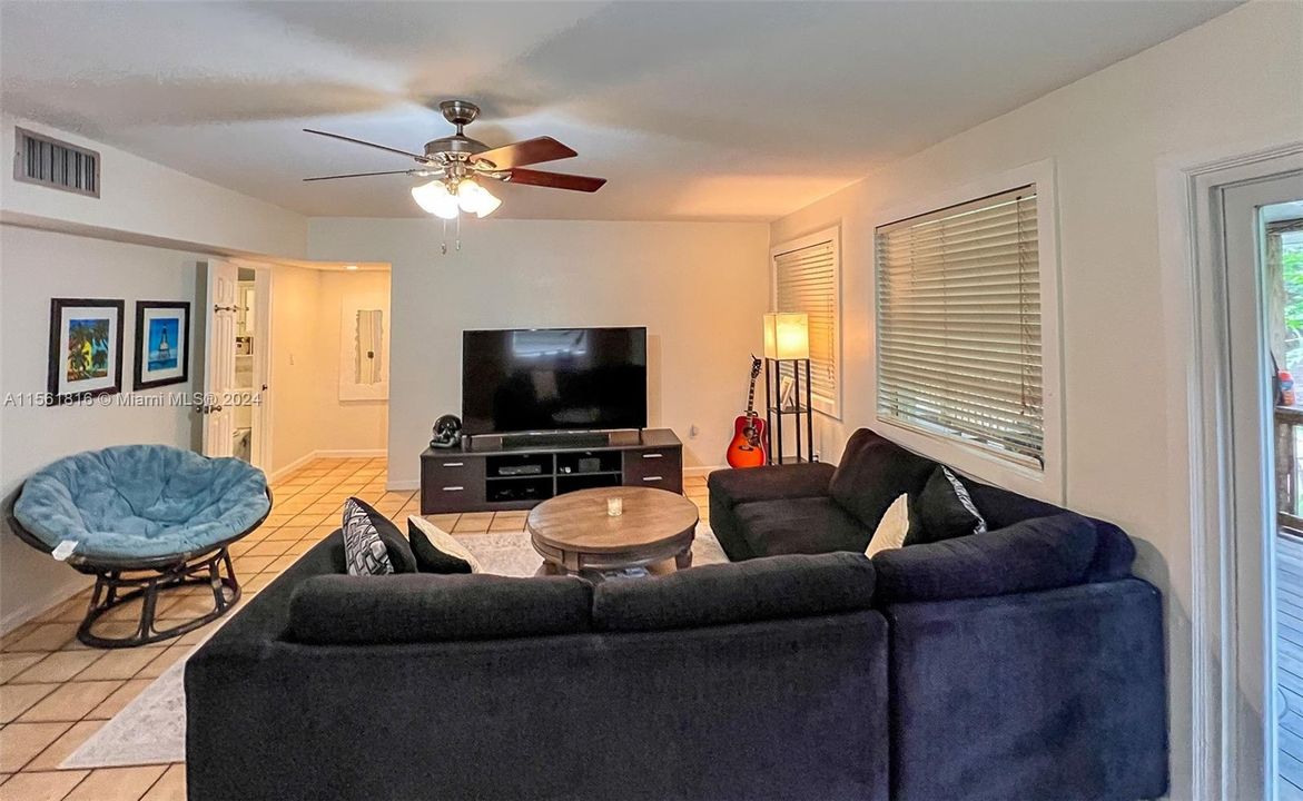Lounge, relax, and entertain in this welcoming living space, complete with plush seating and a warm ambiance that says 'home' the moment you step in.
