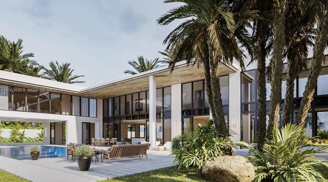 Bask in the serene elegance of our modern luxury villa, featuring sleek glass facades and a crystal-clear infinity pool, amidst lush palm landscapes – the epitome of upscale living.