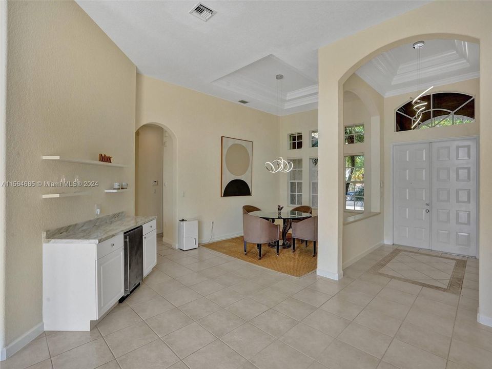 Built-in coffee/beverage bar area to minimize kitchen traffic