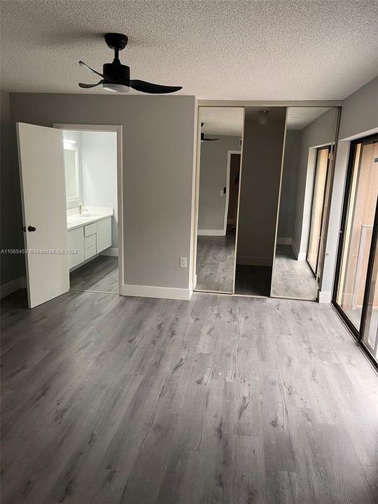 master bedroom with bathroom and walking closet