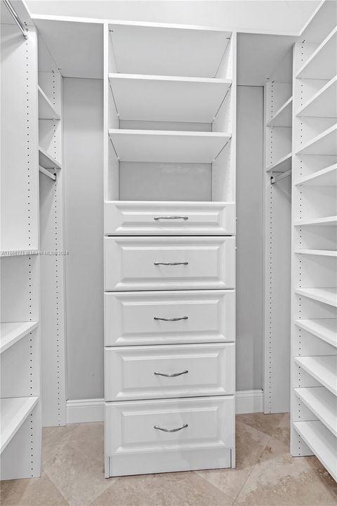 Master Bedroom Walk in Closet & Custom Cabinetry