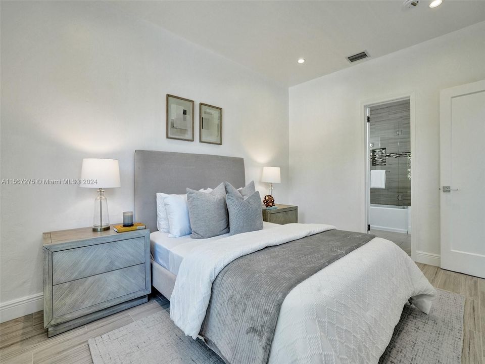 Retreat to the comfort of your spacious master bedroom, complete with a luxurious en-suite bathroom and ample closet space for all your storage needs.