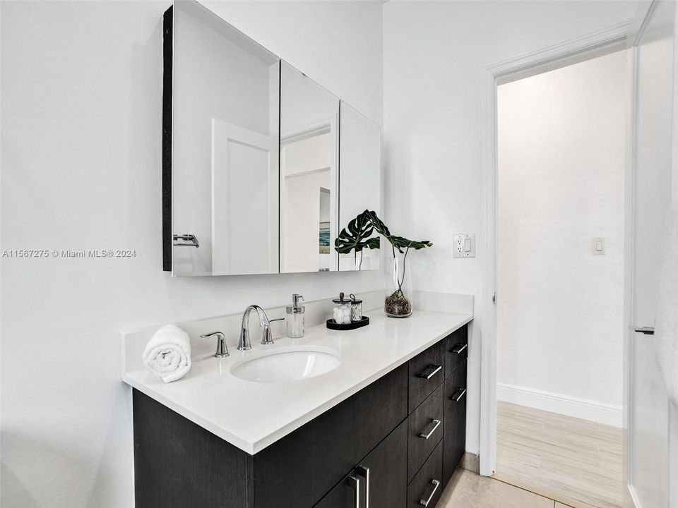 An oversized vanity area with plenty of storage space.