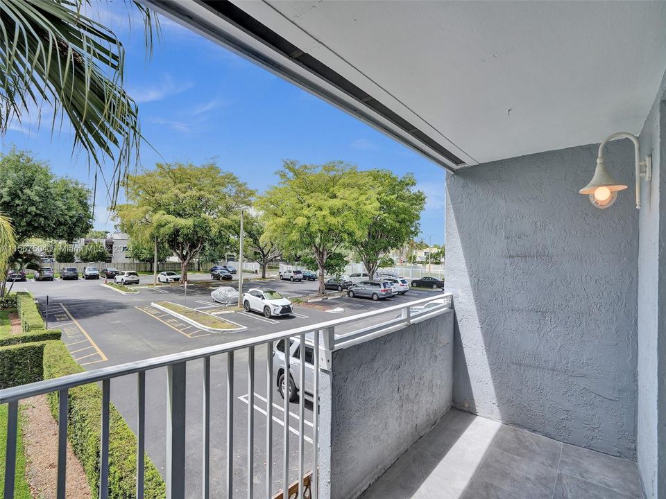 Enjoy S Florida sunshine and relax on your own balcony