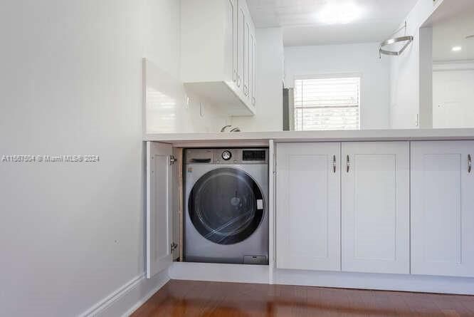 Brand new washer/dryer combo - tastefully installed so as not to use up desirable closet space.