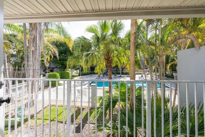 Enjoy S. Florida living at it's best in this sparkling pool and outdoor kitchen