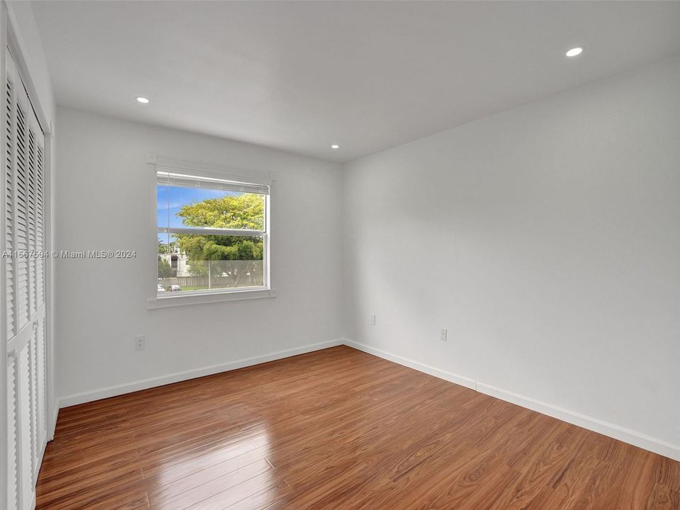 Bdrm #1:  Both bedrooms almost the same size but one has larger wall-to-wall closet