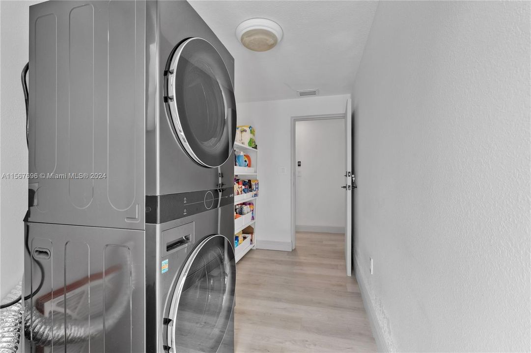 LAUNDRY ROOM W/ PANTRY OPENS OUTDOORS AS WELL