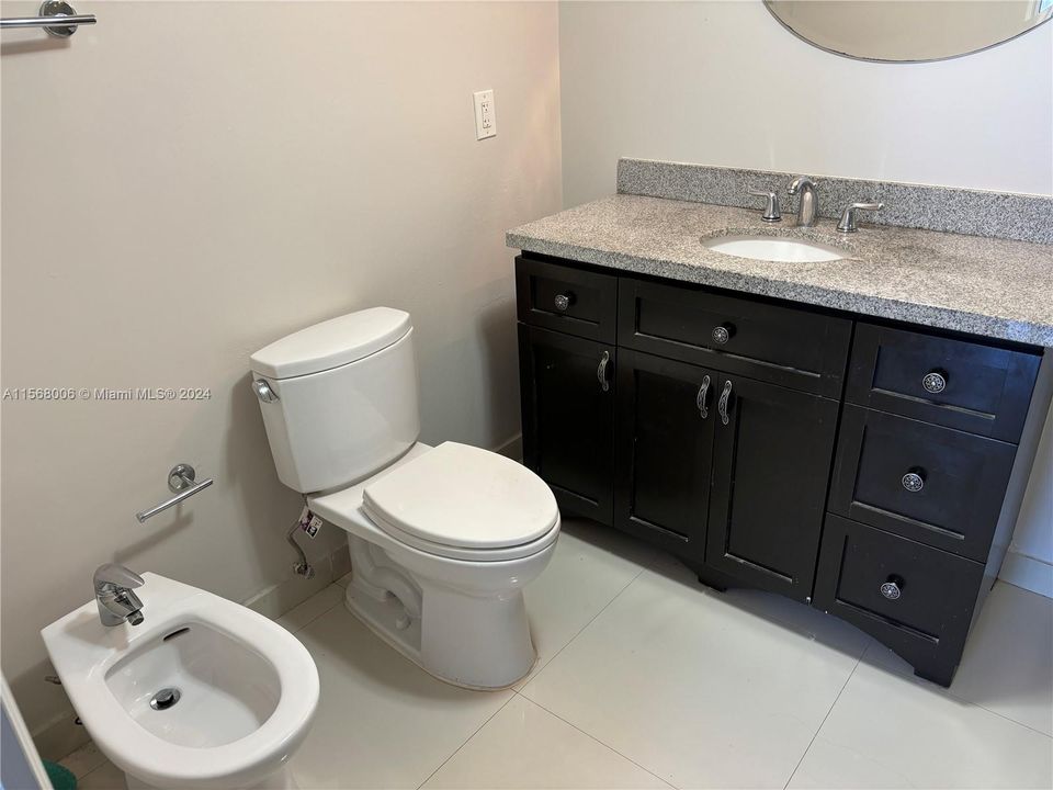 Master Bathroom with an additional bidet toilet.