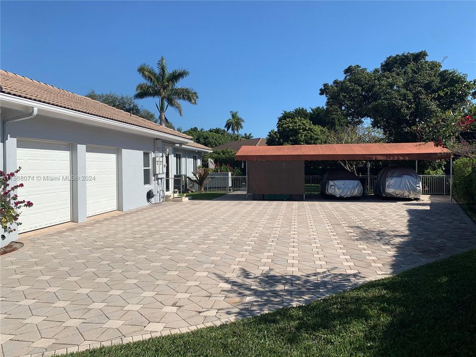 Two Car Garage and Awning covered Carport