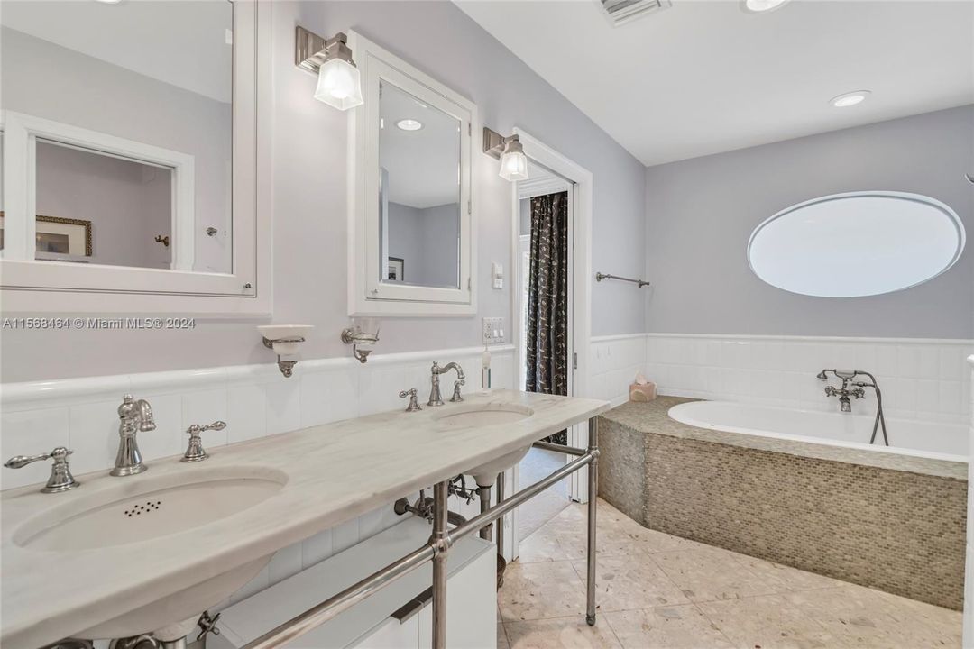 Bath 1 with Dual Sinks/Mirror Medicine Cabinets.