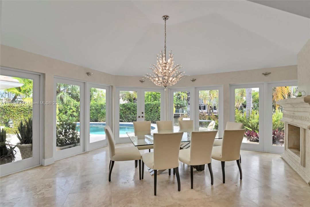 Dining Room faces Pool and Canal view. Volume Ceilings.