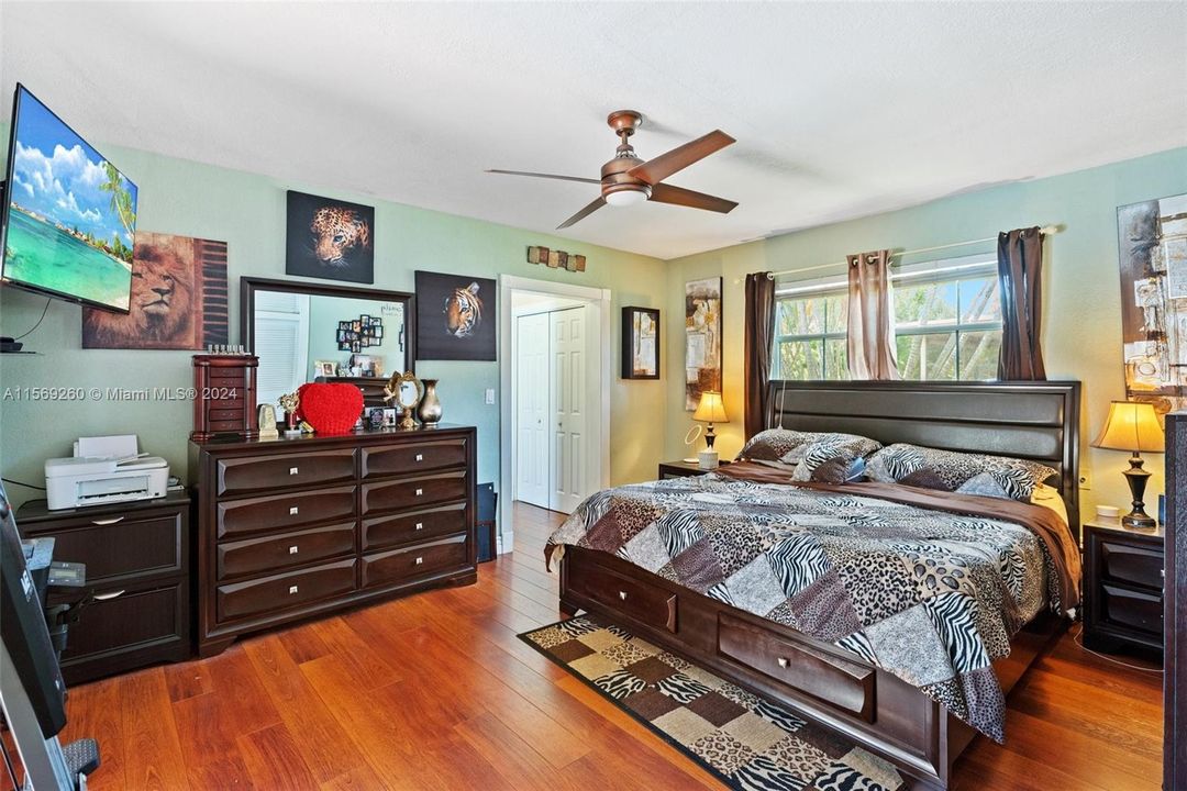 Spacious master bedroom with multiple closets