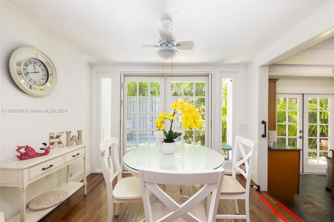 Light and Bright Dining Room with French Doors to the Deck