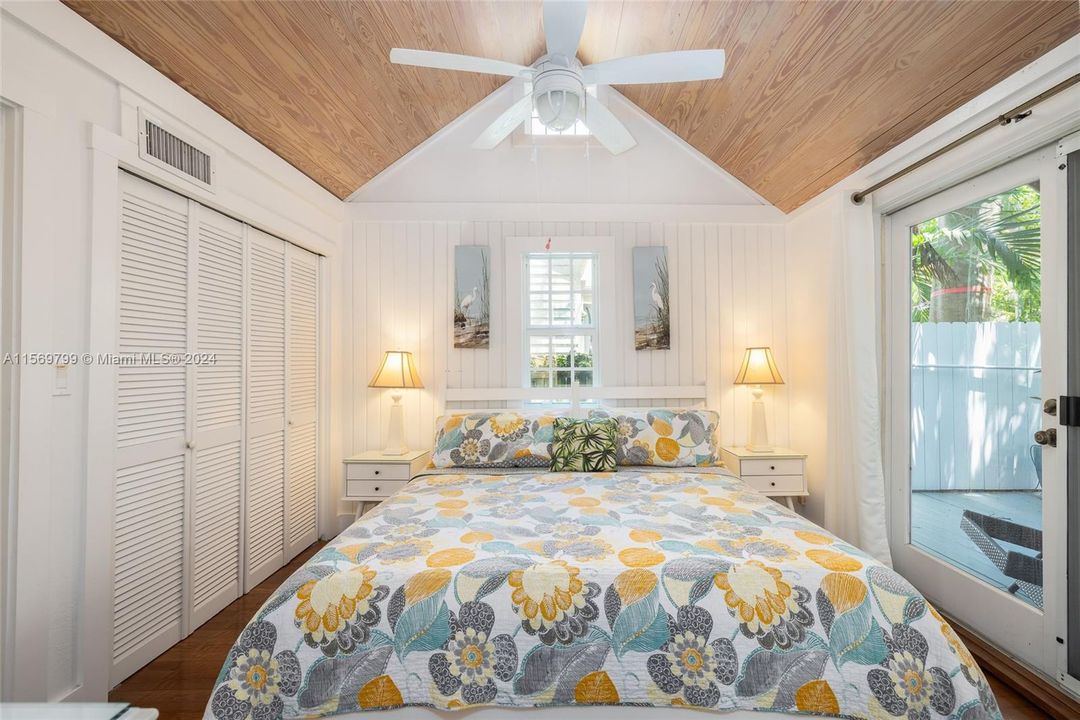 Bedroom 1Features Beautiful wood beamed ceilings and French Doors out to the Lanai.