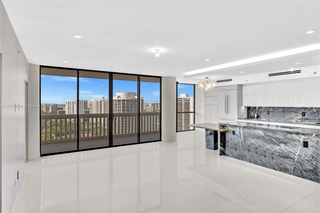SLEEK AND MODERN NEUTRAL COLOR PORCELAIN TILE THROUGHOUT THE UNIT, CUSTOM RECESSED LIGHTING, CUSTOM CONTEMPORARY DESIGNER WALL COVERINGS AND MORE! YOU MUST SEE IT TO BELIEVE IT....