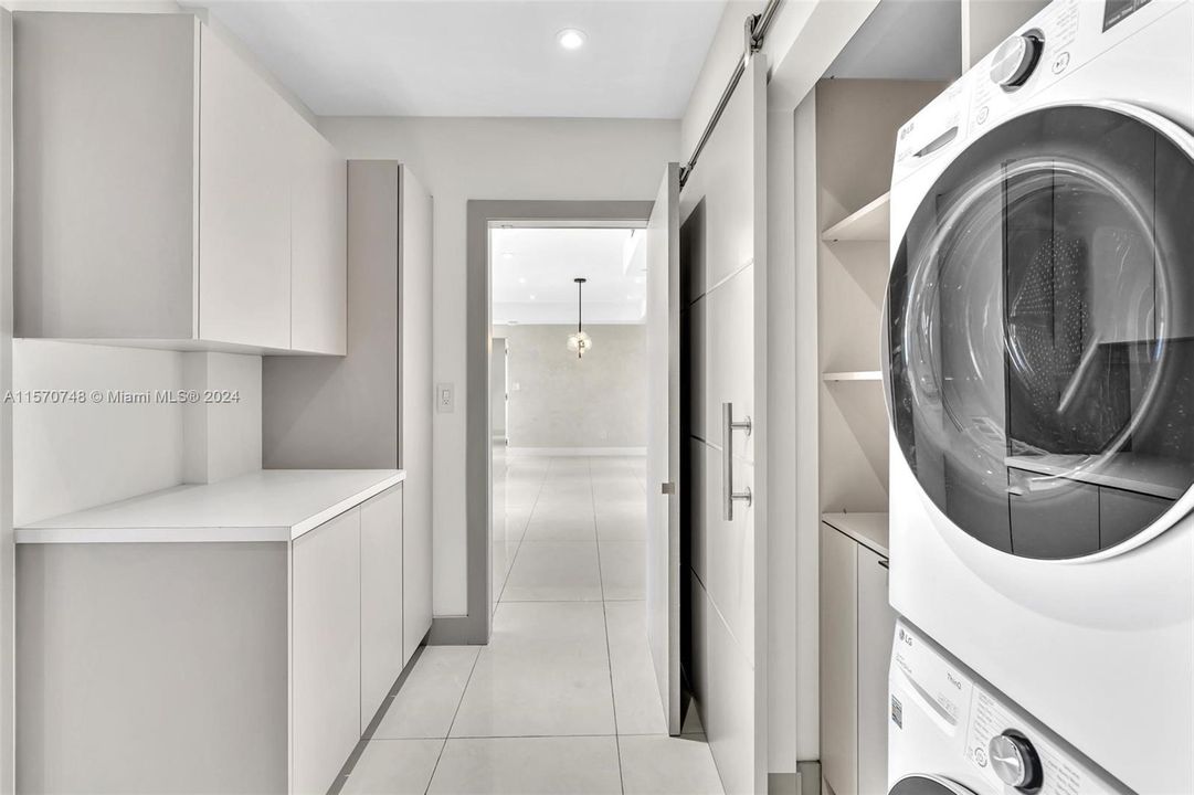 CUSTOM DESIGNED LAUNDRY/UTILITY ROOM MAKES DOING LAUNDRY A DREAM RATHER THAN A CHORE!