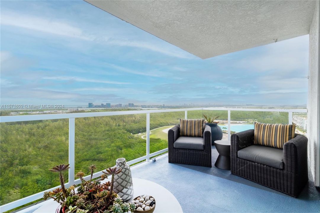 2409 Corner Unit Balcony showing Southeast View of Atlantic Ocean, Biscayne Bay, Oleta State Park & Miami city skyline.  Note: Glass railings to be similar as shown.  Installation in progress.  Seller has paid ALL special assessments in full.
