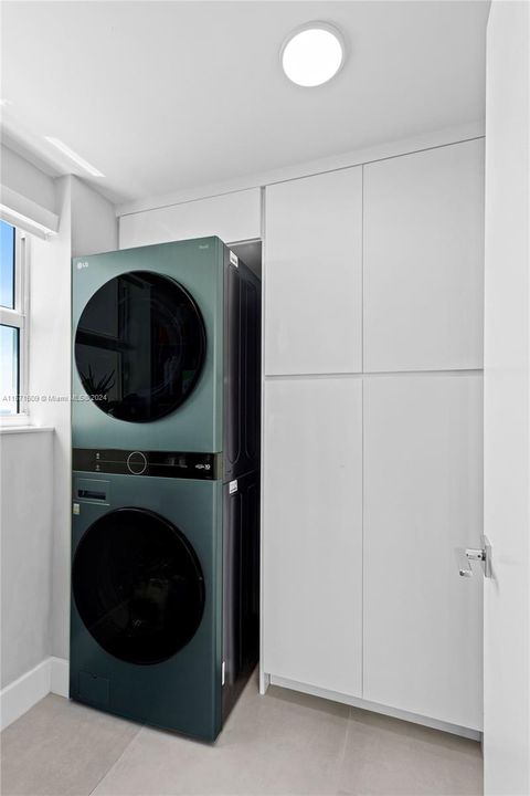 New LG Full Capacity Washer & Dryer.  Pantry has pull-out shelves for easy access.
