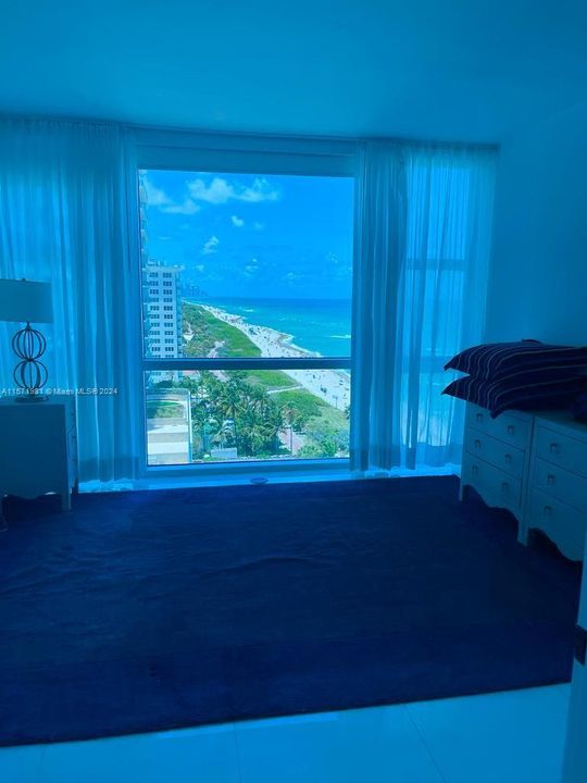 Bedroom with views of the coastline