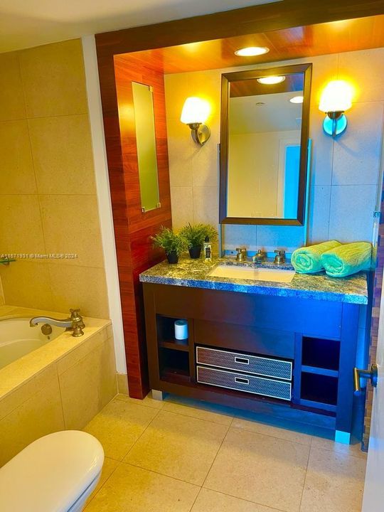 Bathroom with jacuzzi tub & separate shower