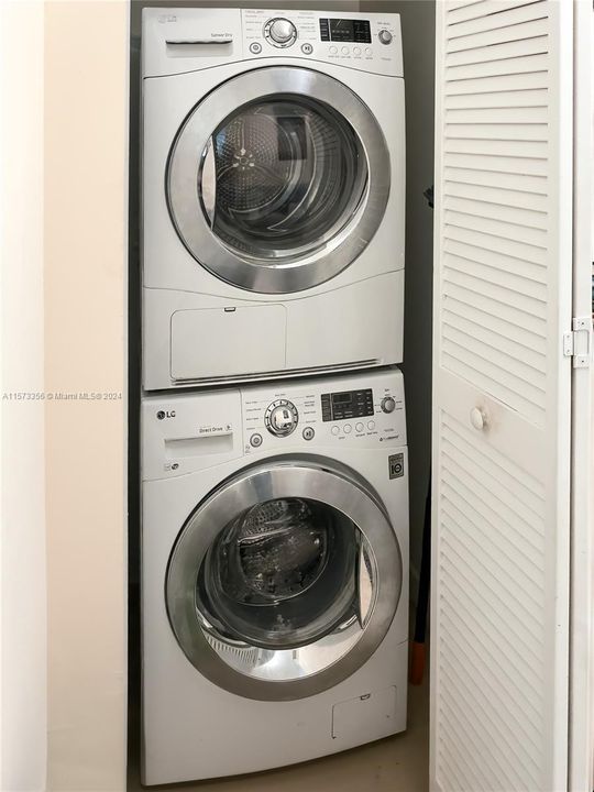 Full size washer and dryer in closet