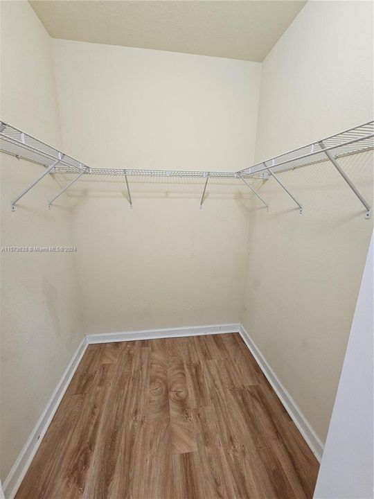Two identical walk-in closets