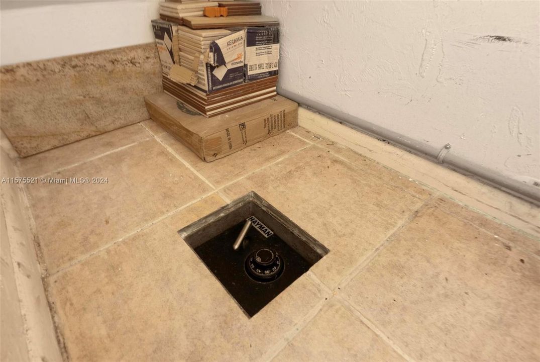 Safe placed in downstairs  closet below tile