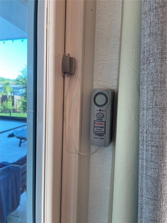 Window safety alarms for pool