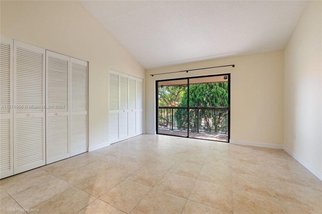 Primary Bedroom with balcony