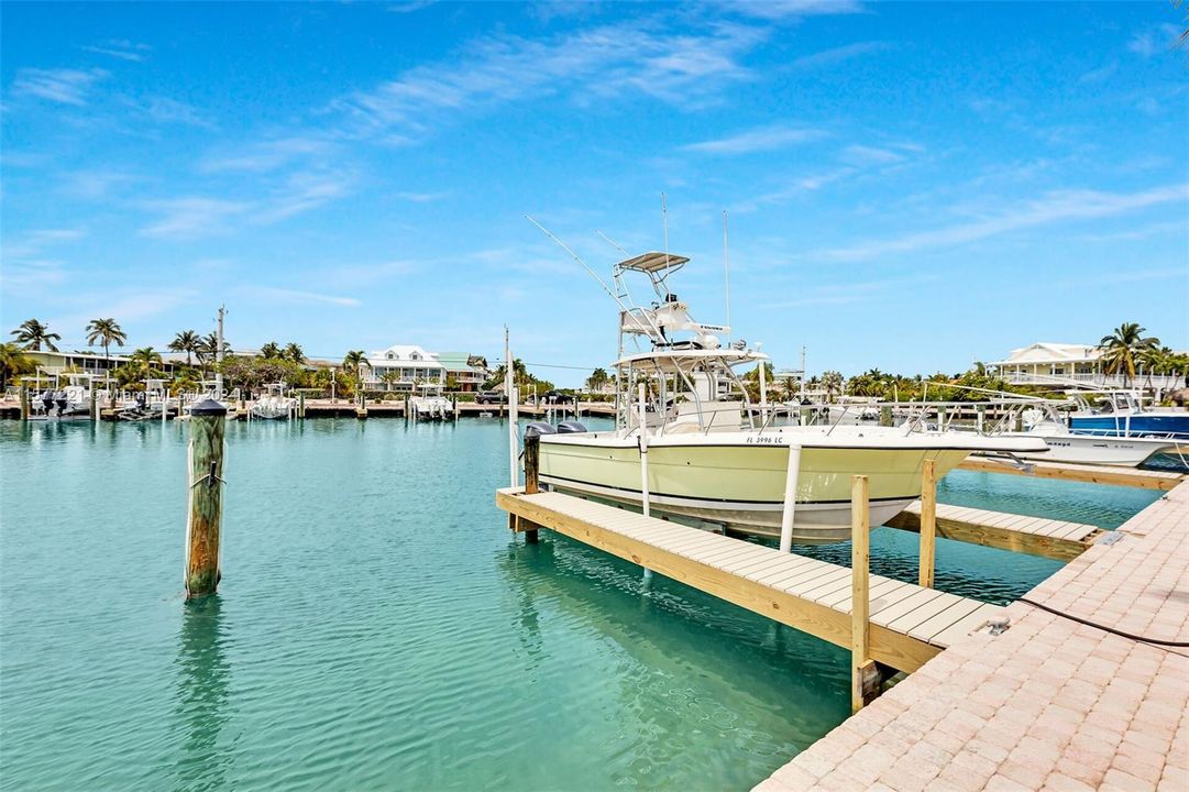 TWO boat slips that will each accommodate boats to 40' LOA, lifts allowed. Private marina is 800' from the property