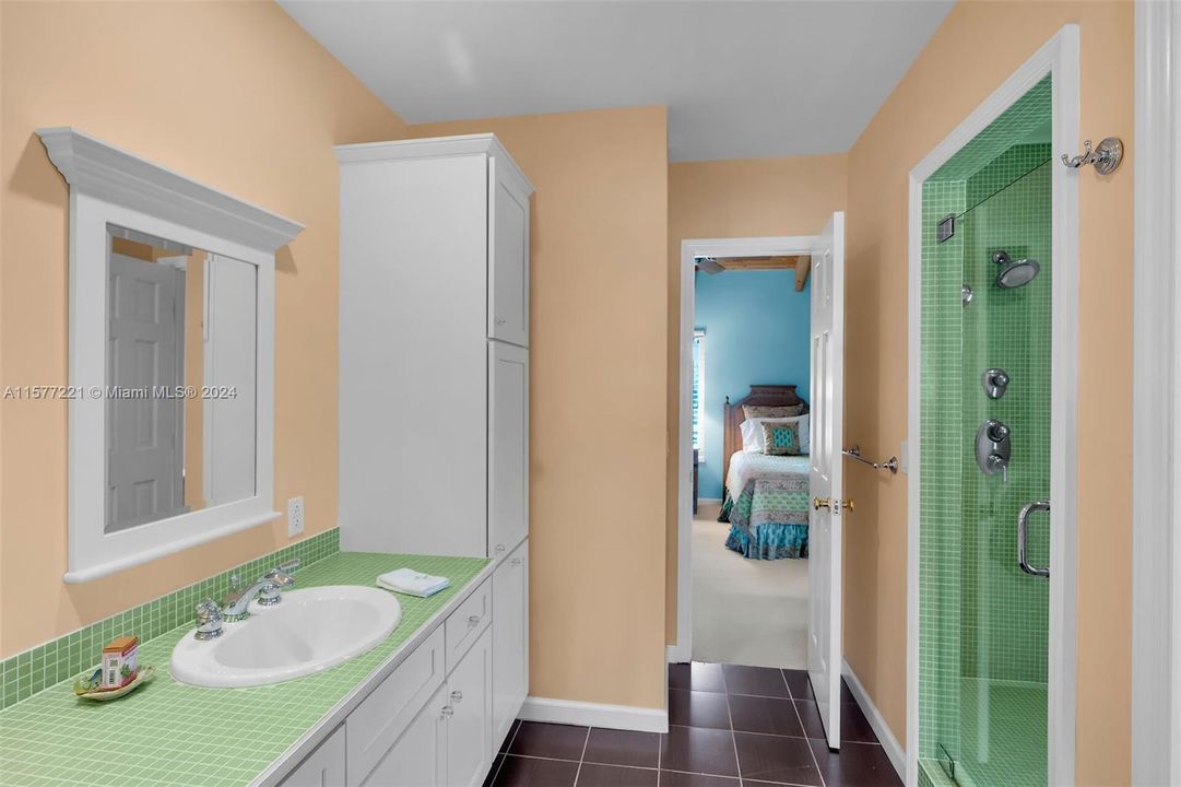 Jack and Jill bath connects two guest bedrooms