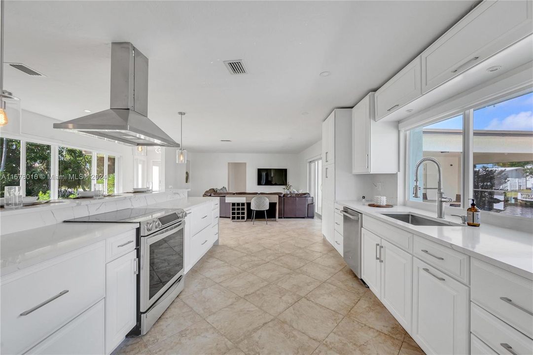 Gourmet Chef's eat-in kitchen looking at den