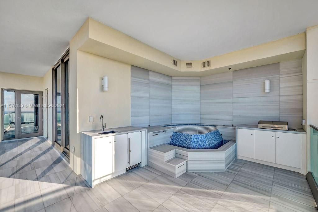 jacuzzi and summer kitchen