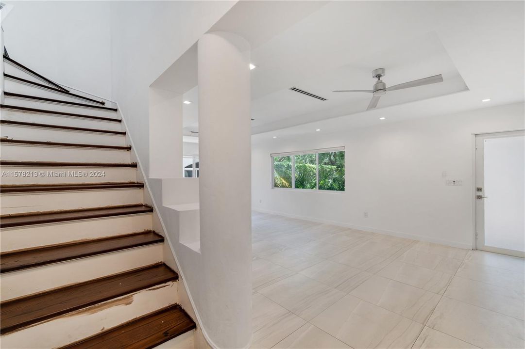 Living room and stairs going to the second floor