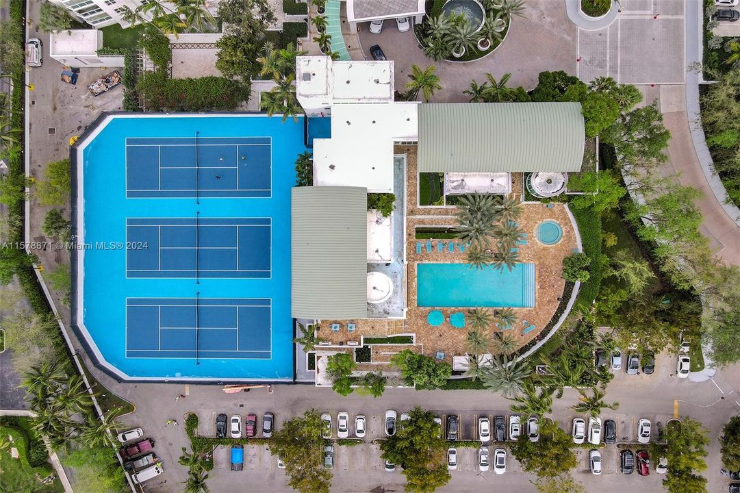 View of the second pool and tennis courts.