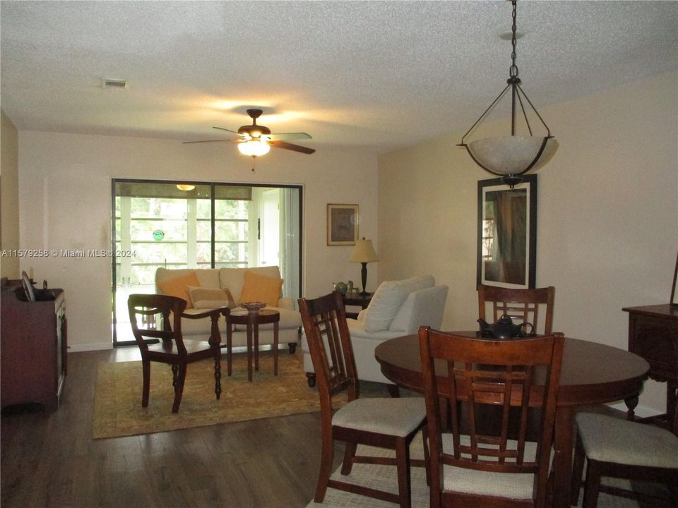 LIVING/DINING AREA WHICH LEADS TO PATIO