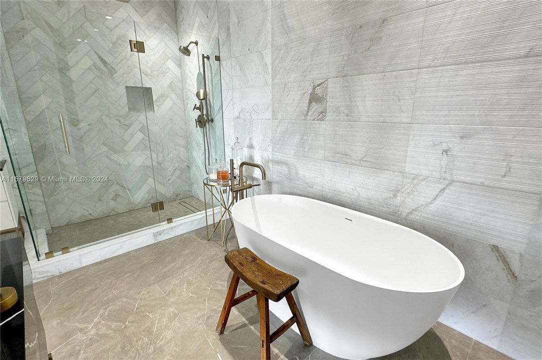 Primary bathroom with stand alone tub