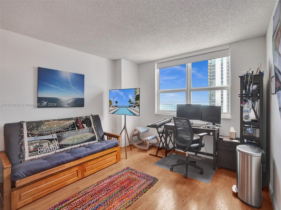 Tenant uses the master bedroom as an office due to the beautiful view,