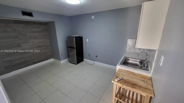 KITCHEN AND SMALL LIVING ROOM AREA