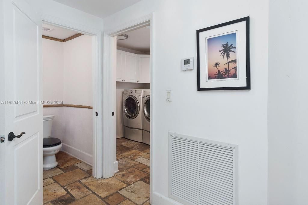 LAUNDRY ROOM NEXT TO OFFICE AND 1/2 BATH