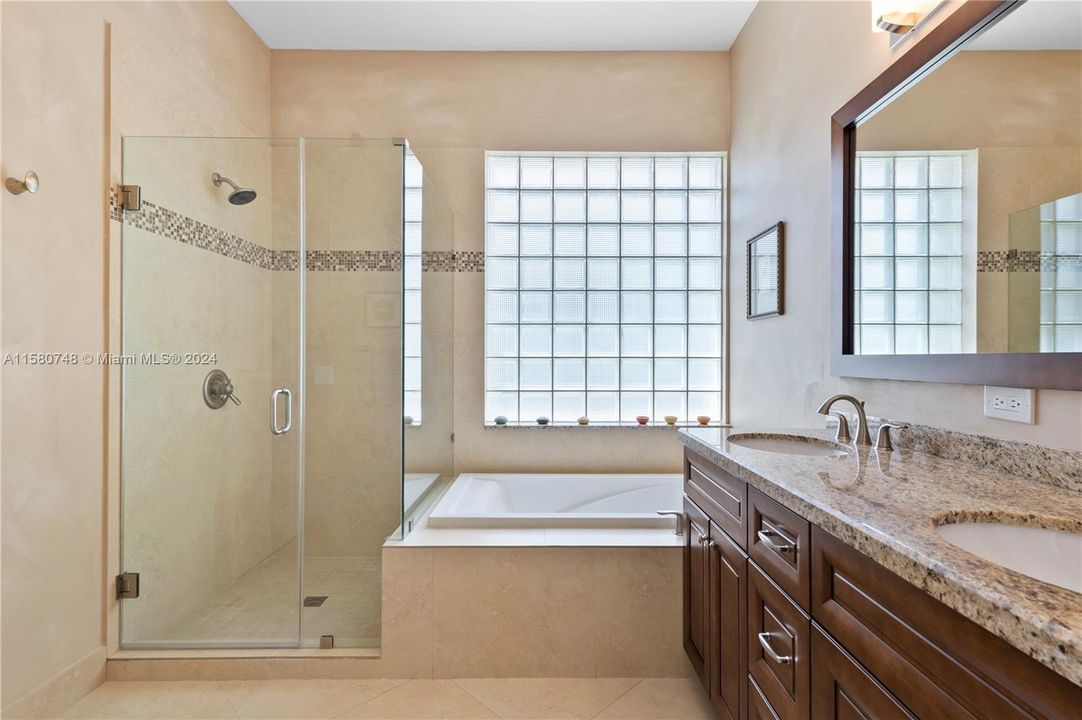 Primary bath updated- dual vanities separate tub & shower