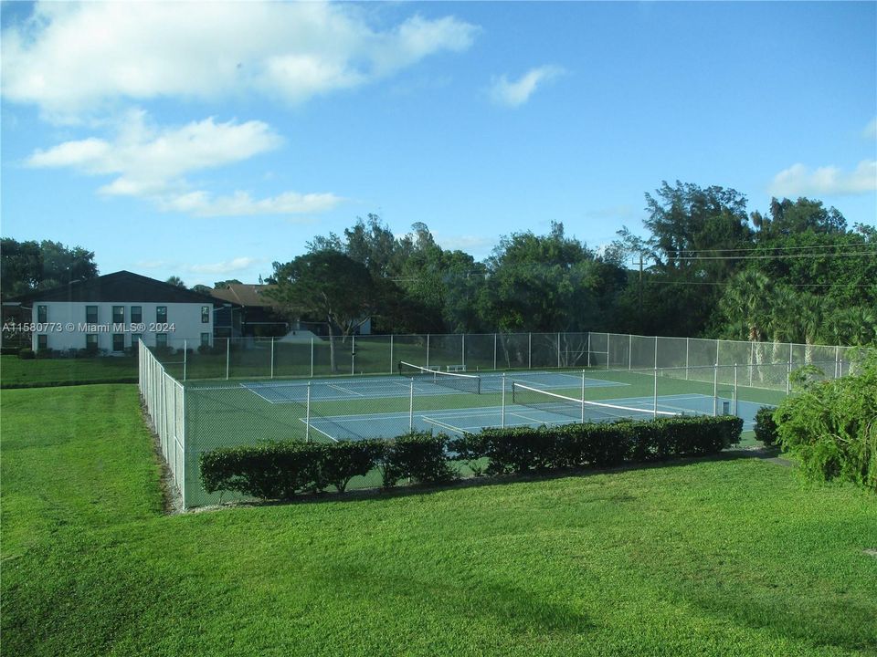 THE VIEW FROM MASTER BEDROOM OF TENNIS/PICKLE BALL COURTS